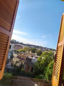 a view of a city from a balcony at Domus Getsemani in Rome