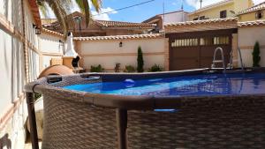 a swimming pool in the backyard of a house at Alquería Las Torres a dos pasos de Toledo y de Las Barrancas de Burujón in Escalonilla