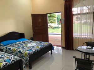 Un pat sau paturi într-o cameră la Hospedaje Adrimaran