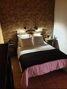En eller flere senge i et værelse på CasaAbuela