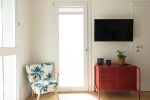TV a/nebo společenská místnost v ubytování Da Coco - Rooms