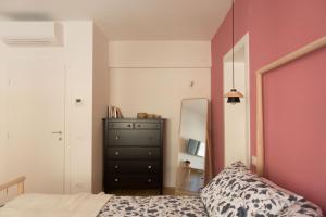 Postel nebo postele na pokoji v ubytování Da Coco - Rooms