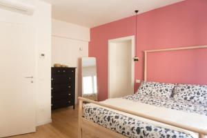 Postel nebo postele na pokoji v ubytování Da Coco - Rooms
