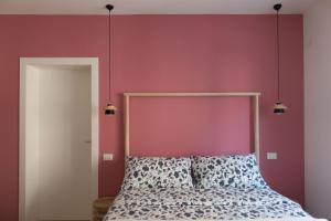 Postel nebo postele na pokoji v ubytování Da Coco - Rooms
