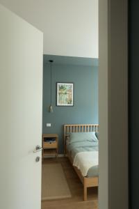 Postel nebo postele na pokoji v ubytování Da Coco - Rooms