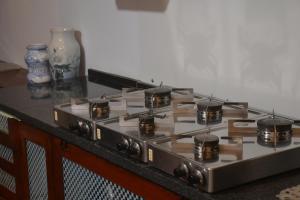a stove top oven sitting on top of a counter at Fieschi Inn in Genoa