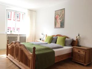 Säng eller sängar i ett rum på Heidelberg Apheartments