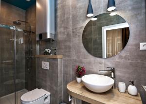 Kúpeľňa v ubytovaní Riva Luxury Rooms