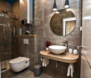 Kúpeľňa v ubytovaní Riva Luxury Rooms