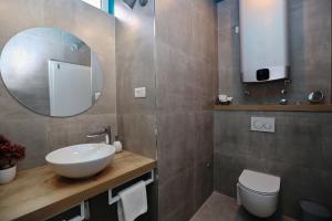 Kúpeľňa v ubytovaní Riva Luxury Rooms