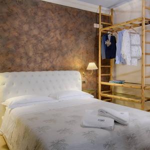 Ліжко або ліжка в номері Egò Salento