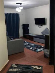 A television and/or entertainment centre at Studio chalet Porto South Beach families