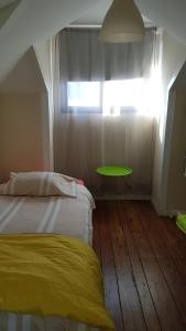 Ένα ή περισσότερα κρεβάτια σε δωμάτιο στο Apartamento Costa Cabral