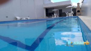 The swimming pool at or close to Apto no Universitário Ed. Mr. Teneriff 310