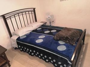 Postel nebo postele na pokoji v ubytování Monchita's Ensenada Baja, apartments for rent.