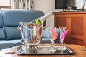 a bottle of wine in a blender on a table at Villa Pintor in Port de Pollensa