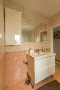 Kúpeľňa v ubytovaní Apartman Pannonica Pin 0-24h + 37 fotografií