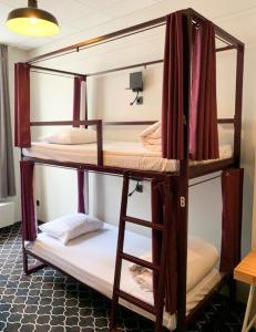 
A bunk bed or bunk beds in a room at Safestay Brussels
