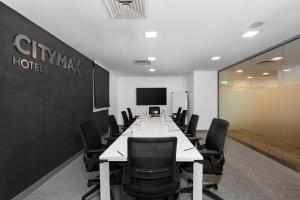 a conference room with a long table and chairs at Citymax Hotel Bur Dubai in Dubai