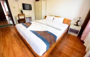 Letto o letti in una camera di Heritage Home Dhulikhel