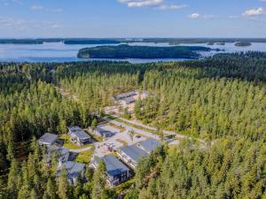 an aerial view of a building in the middle of a forest at Saimaa LIGHT in Imatra