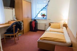 Postel nebo postele na pokoji v ubytování Hotel Landgasthof Lell