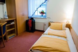 Postel nebo postele na pokoji v ubytování Hotel Landgasthof Lell