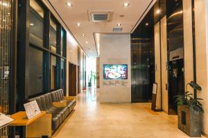 TV a/nebo společenská místnost v ubytování ON City Hotel