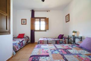 Posteľ alebo postele v izbe v ubytovaní Loma Méndez Casa 3