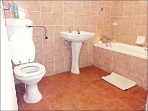 Ванная комната в Ambiente Budget Accommodation
