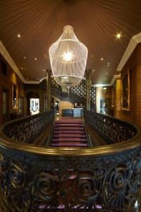 a large stairway leading to a large room at Malmaison Dundee in Dundee