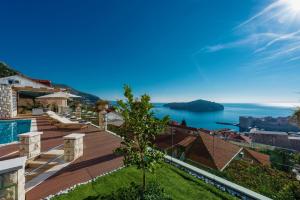 a villa with a view of the water at Villa Vega in Dubrovnik