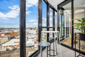 a view from the top of a building with windows at KOZYGURU FORTITUDE VALLEY DESIGNER GRADE 2 BED APT FREE PARKING QFV179-1401 in Brisbane