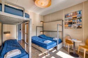 Krevet ili kreveti na sprat u jedinici u okviru objekta Stayokay Hostel Texel