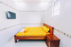 Postel nebo postele na pokoji v ubytování Motel Phạm Lũy