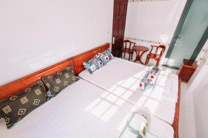 Postel nebo postele na pokoji v ubytování Motel Phạm Lũy