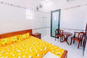 Postel nebo postele na pokoji v ubytování Motel Phạm Lũy