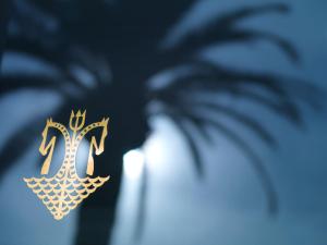 a close up of a sign with a number ten on it at Hôtel Juana in Juan-les-Pins