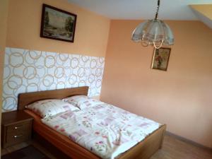 Кровать или кровати в номере Agroturystyka Nad Cichą +9 фотографий