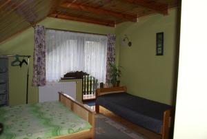 Postel nebo postele na pokoji v ubytování Agrogosia