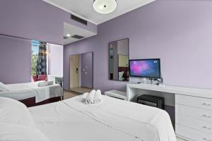 TV a/nebo společenská místnost v ubytování Hotel Relax