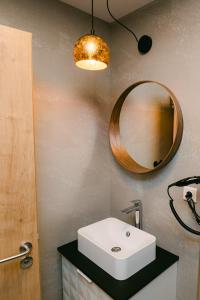 Ванная комната в Svarog Unique Apartment