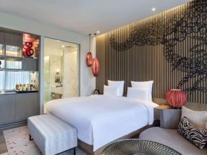 Pullman Ciawi Vimala Hills Resort客房内的一张或多张床位