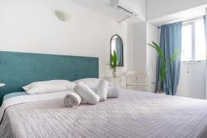 Posteľ alebo postele v izbe v ubytovaní Islanders Yard Apartments