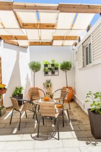 Patio alebo iná vonkajšia časť ubytovania Islanders Yard Apartments