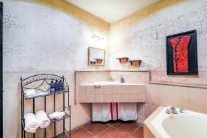 Vonios kambarys apgyvendinimo įstaigoje Casa Serenidad