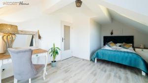 Łóżko lub łóżka w pokoju w obiekcie Wonder Home - Apartamenty w cichej i zielonej części Karpacza - z miejscem na grilla i parkingiem