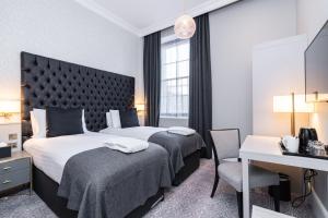 Easthampstead Park客房内的一张或多张床位