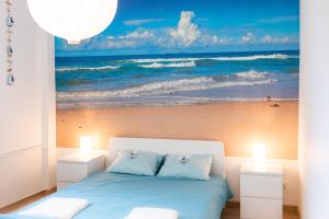 Posteľ alebo postele v izbe v ubytovaní Apartament Blue Sea Gdynia