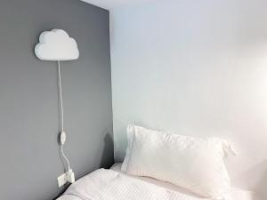 Voodi või voodid majutusasutuse Kenting Sunhow Inn toas